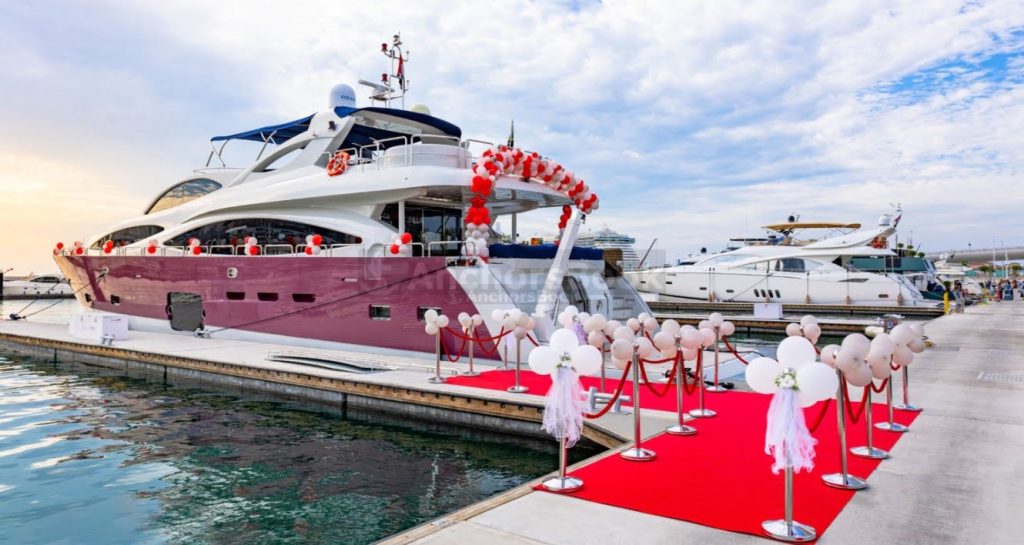 Bachelor/ Bachelorette Package | AnchorsBook Photo red carpet luxury yacht entrance in dubai marina for rental parties