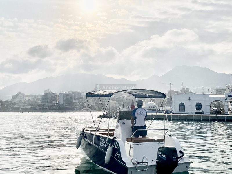 Benalmádena: Rent Boat without License - Trimaran | AnchorsBook Photo Benalmádena: Rent Boat without License - Trimaran