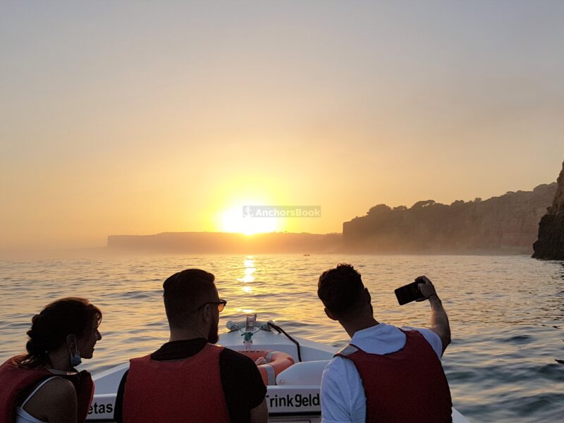 Shared Group SUNSET Boat Tour from Lagos to Ponta da Piedade with Local Guide | AnchorsBook Photo Shared Group SUNSET Boat Tour from Lagos to Ponta da Piedade with Local Guide