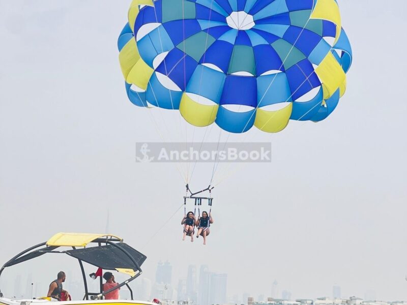 Dubai Parasailing For 2 Guests (30 Minutes) | AnchorsBook Photo Dubai Parasailing For 2 Guests (30 Minutes)